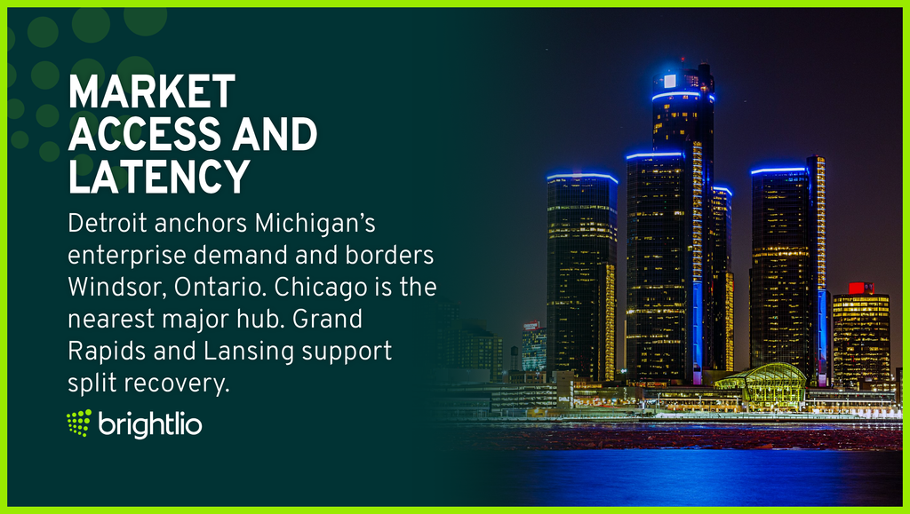 Market Access And Latency for Colocation in Michigan Shown Through the Detroit Renaissance Center Skyline at Night Across the Detroit River